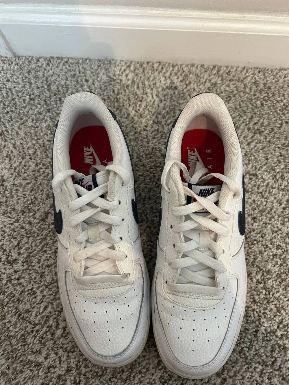 Nike Kids White Sneakers with Black Swoosh and Gum Sole